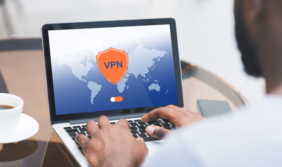 Man Using Laptop Computer With VPN Virtual Private Network Connection For cybersecurity